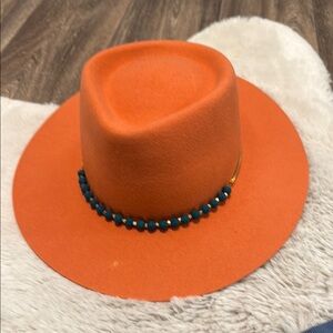 Stylish Orange Van Palma Hat with Beaded Band